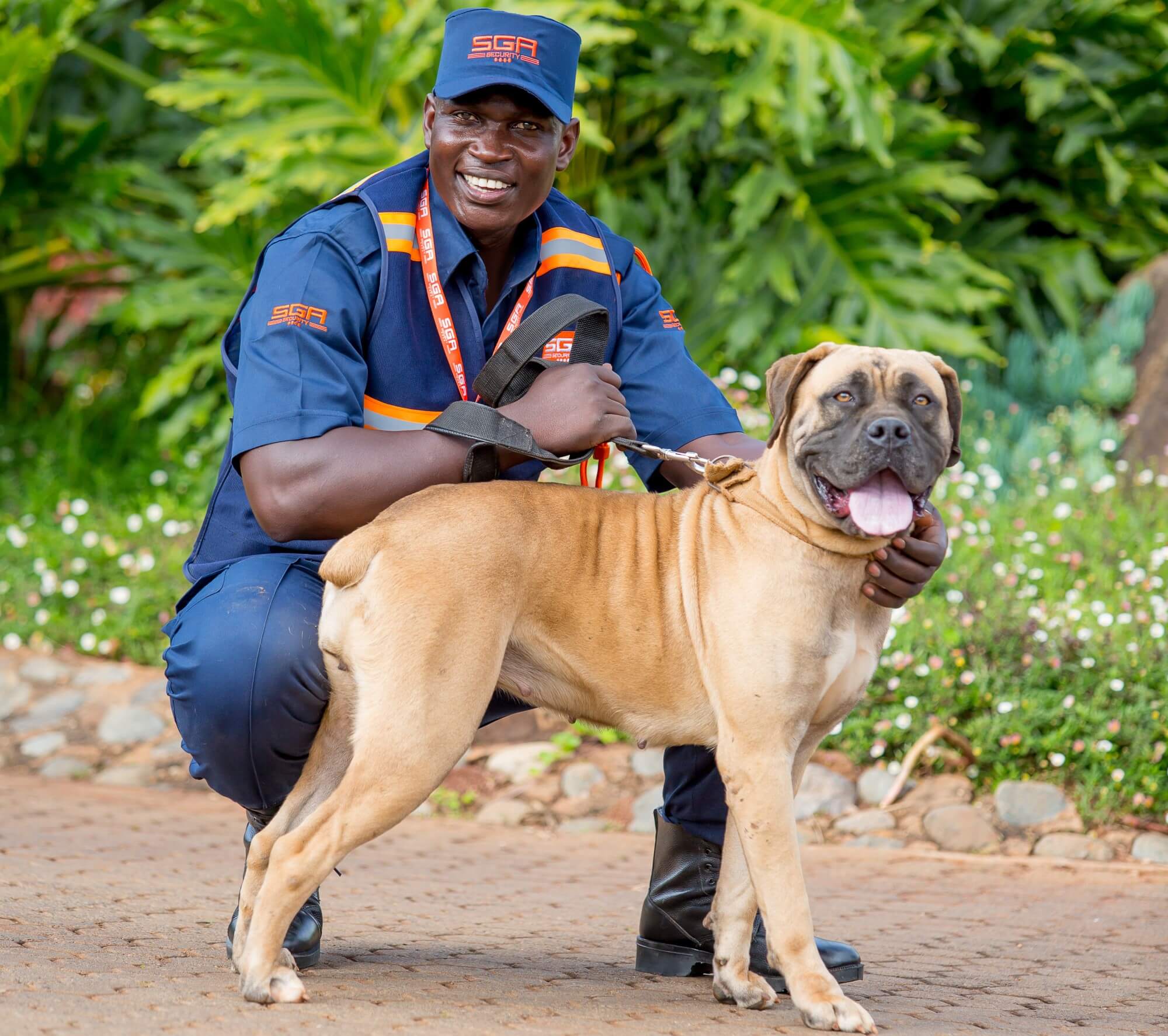 Male dog handler posing with dog
