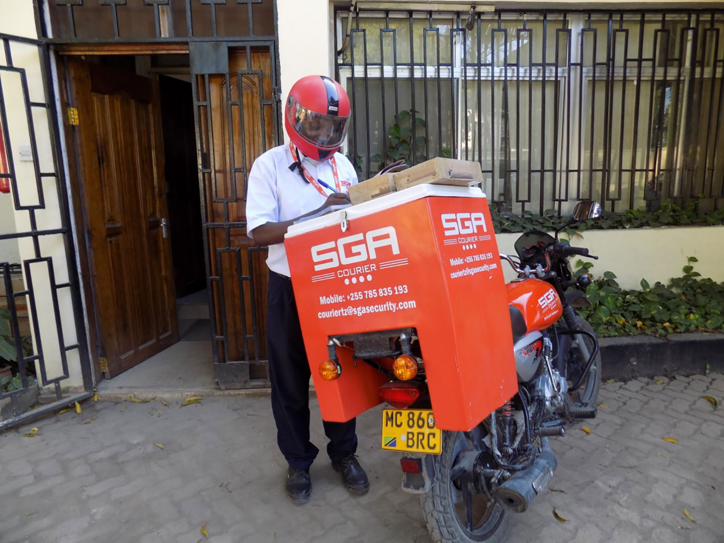 SGA courier personnel at work